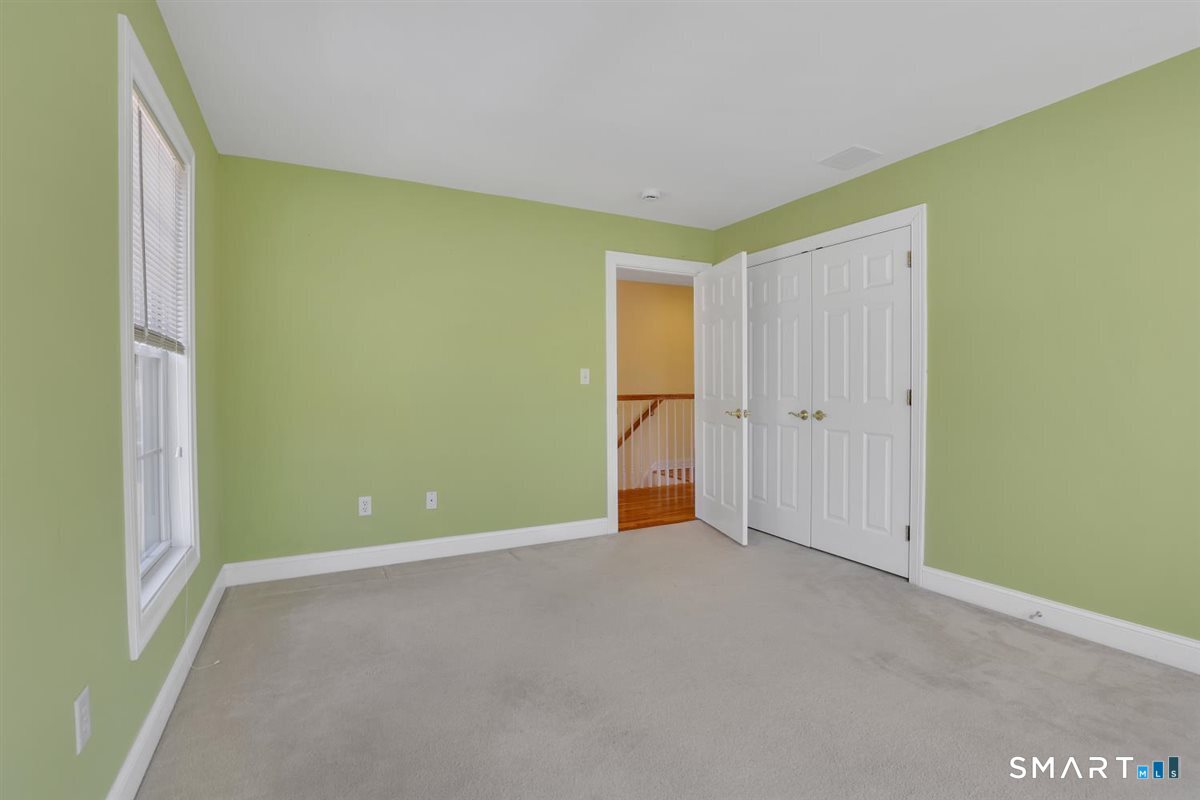 25 Fenwick Drive Avon, CT 06001 - Photo 26 of 40 a view of an empty room with a window