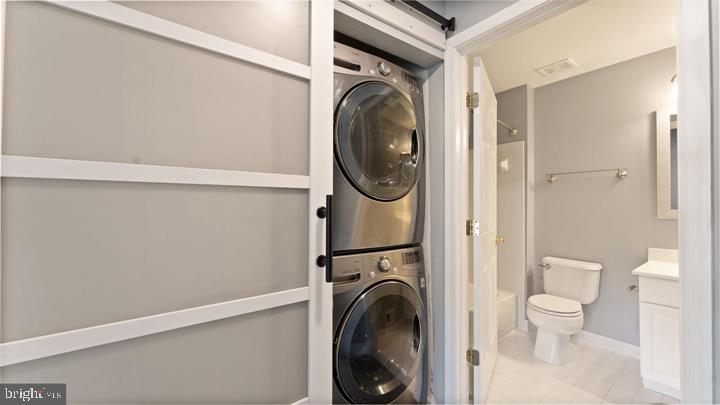 1918 Crescent Park Drive Reston, VA 20190 - Photo 23 of 33 Stylish laundry nook in modern bath.