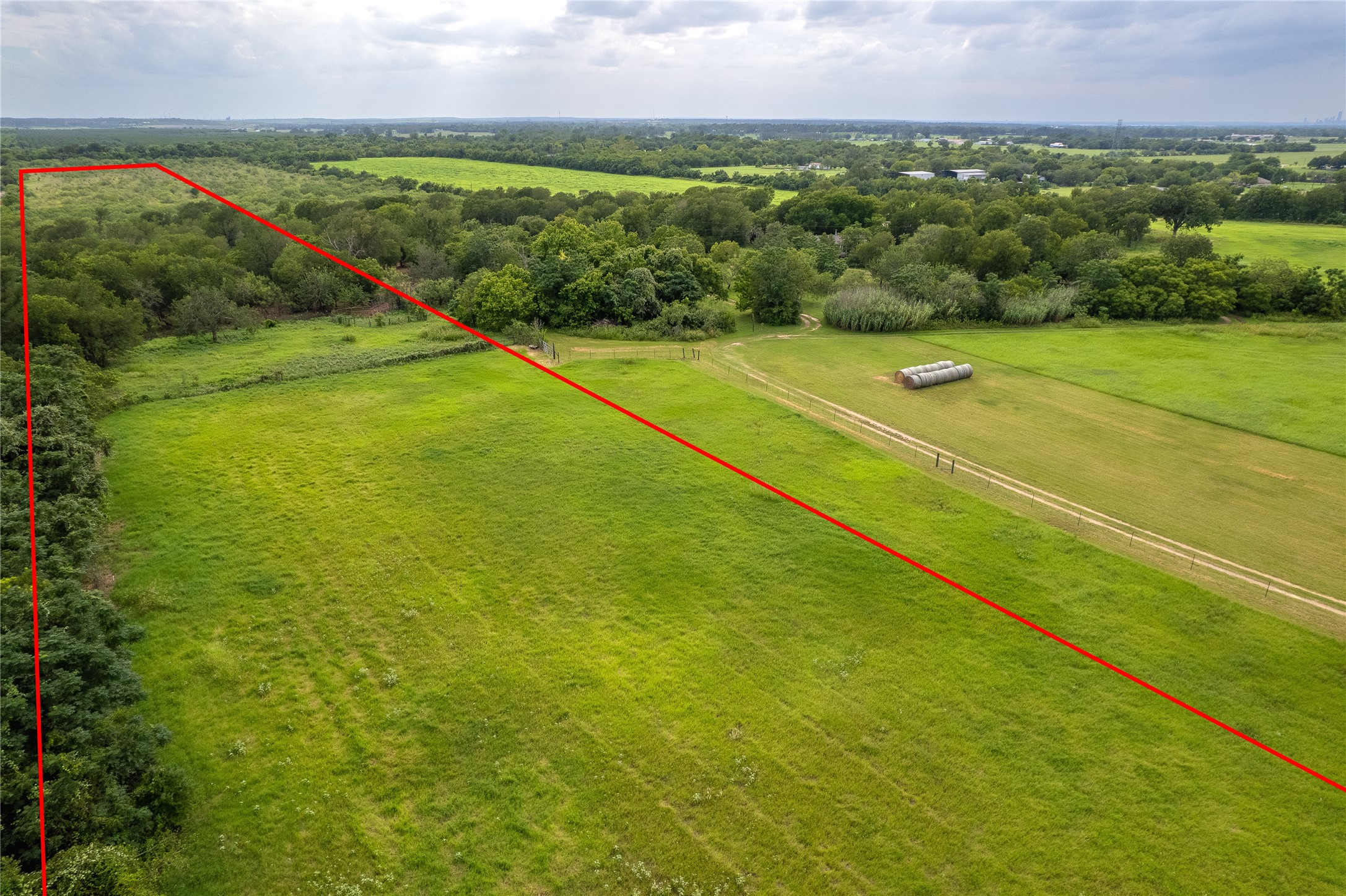 969 Rd Elgin Tx 78602 Road Elgin, TX 78621 - Photo 9 of 17 Aerial view of sparsely populated area with property boundaries highlighted