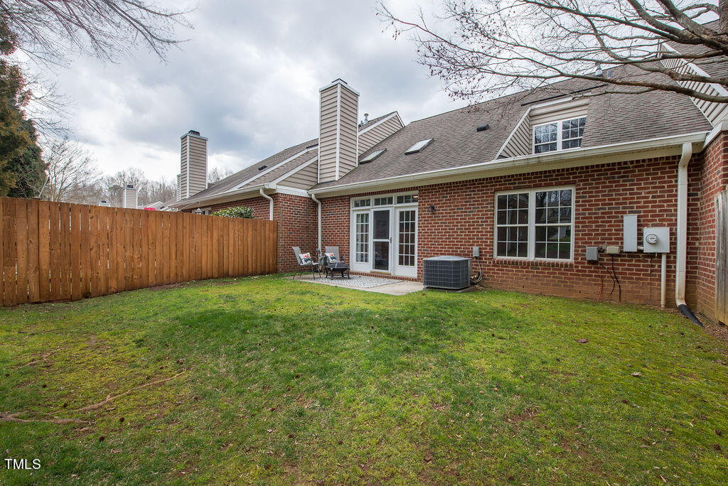 8728 Compass Lane Raleigh, NC 27615 - Photo 16 of 17 Partially fenced Yard