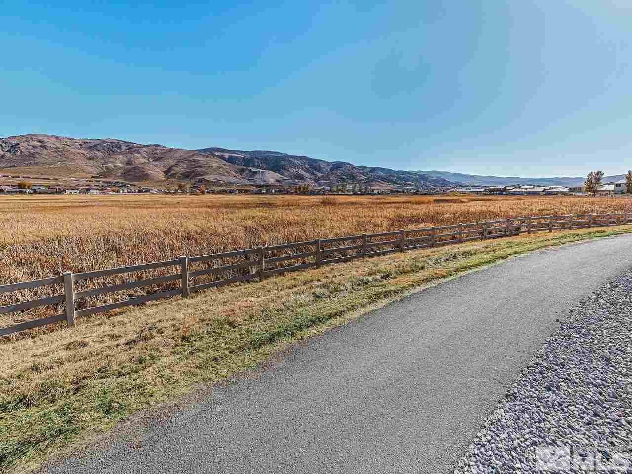 1890 Dark Horse Road, Unit 1062 Reno, NV 89521 - Photo 19 of 19 a view of an ocean and mountain