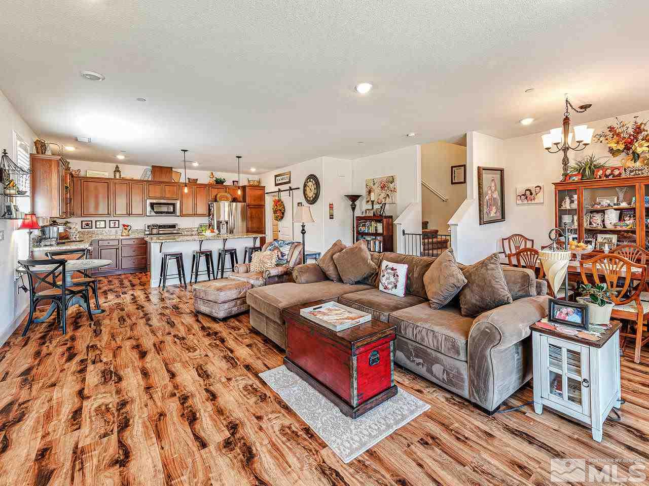1890 Dark Horse Road, Unit 1062 Reno, NV 89521 - Photo 5 of 19 a living room with furniture and a large window