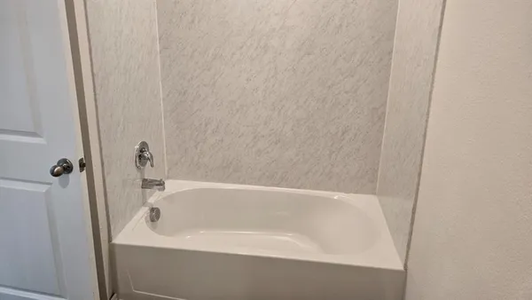 a bathroom with a bathtub