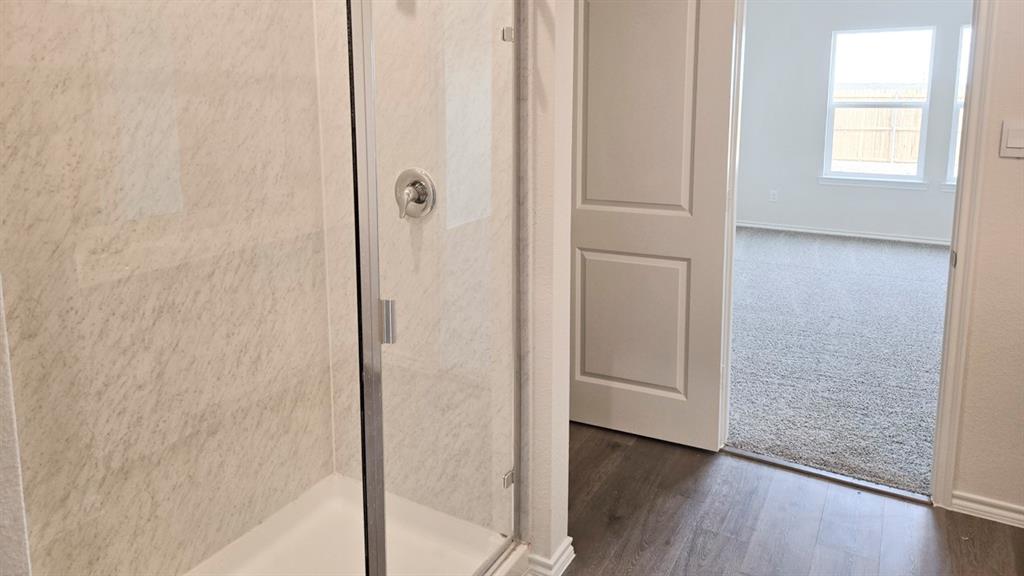 920 Jefferson Way Sherman, TX 75090 - Photo 6 of 21 a view of a hallway with wooden floor
