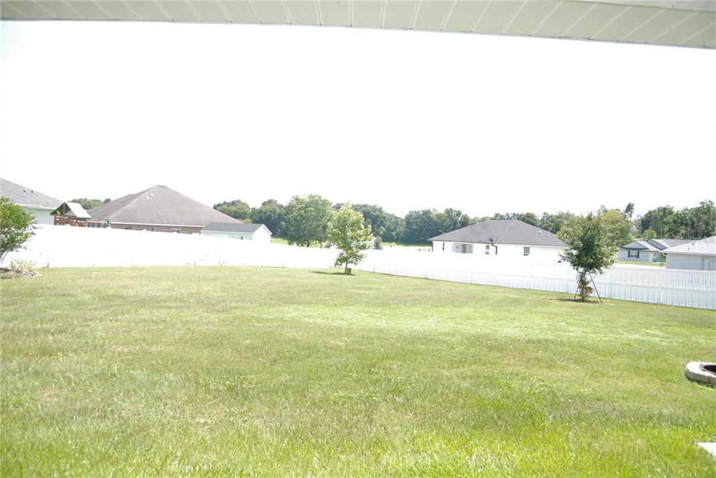 1167 Southeast 63rd Ct Road Ocala, FL 34472 - Photo 30 of 37 a view of an ocean and a mountain