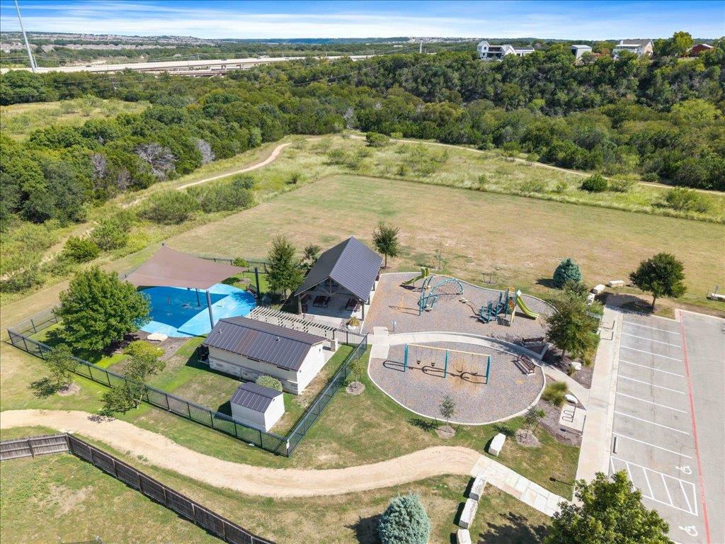192 Spotted Rail Ridge Leander, TX 78641 - Photo 25 of 34 an aerial view of residential houses with outdoor space