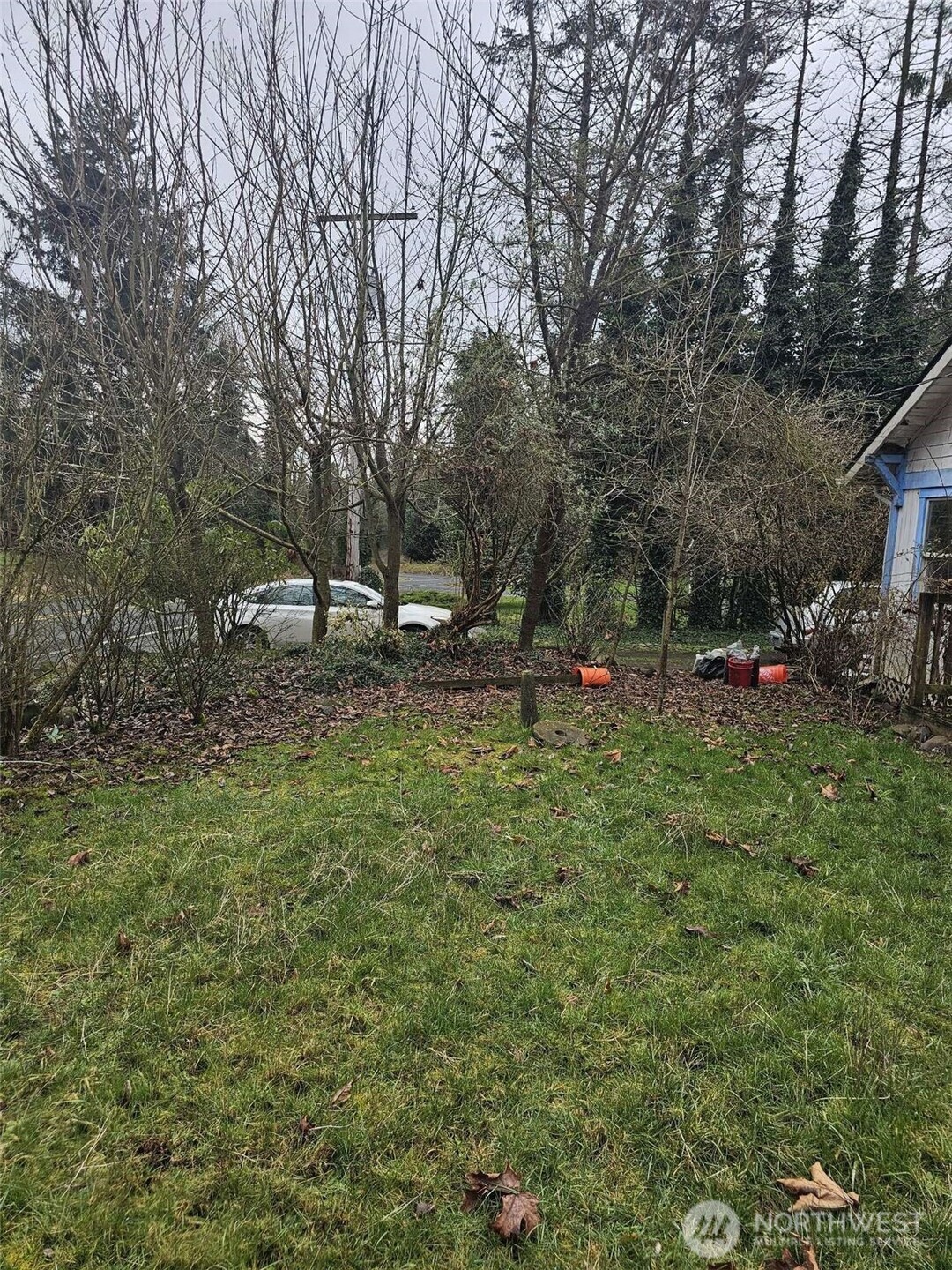 646 Jorgensen Road Onalaska, WA 98570 - Photo 11 of 14 a backyard of a house with table and chairs