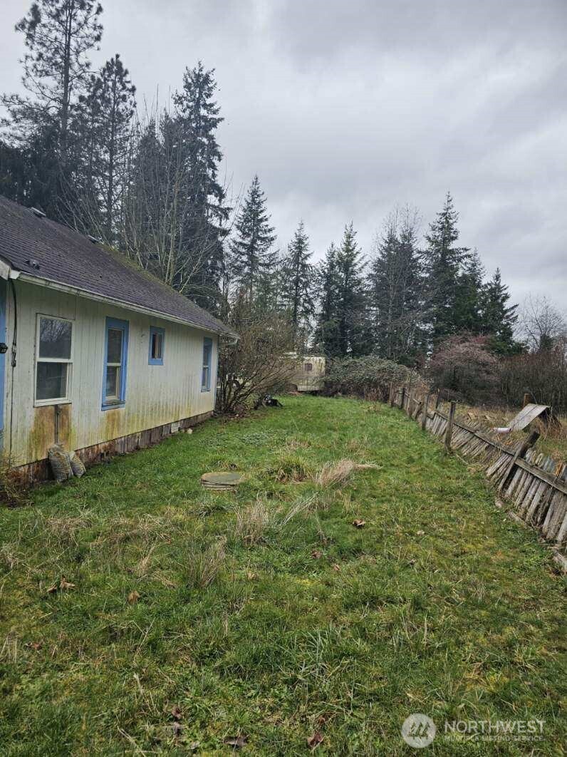 646 Jorgensen Road Onalaska, WA 98570 - Photo 6 of 14 a view of a backyard with plants and large trees