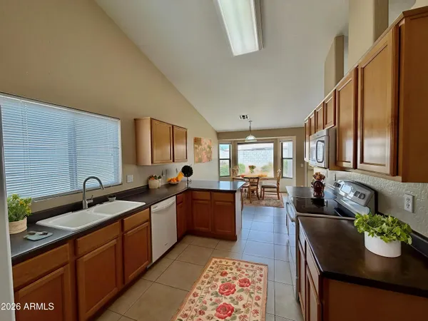 a kitchen with granite countertop lots of counter top space