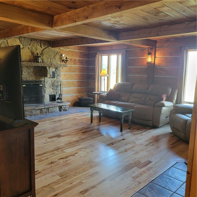 223 Seven Hills Road Chicora, PA 16025 - Photo 9 of 25 a living room with furniture and a wooden floor