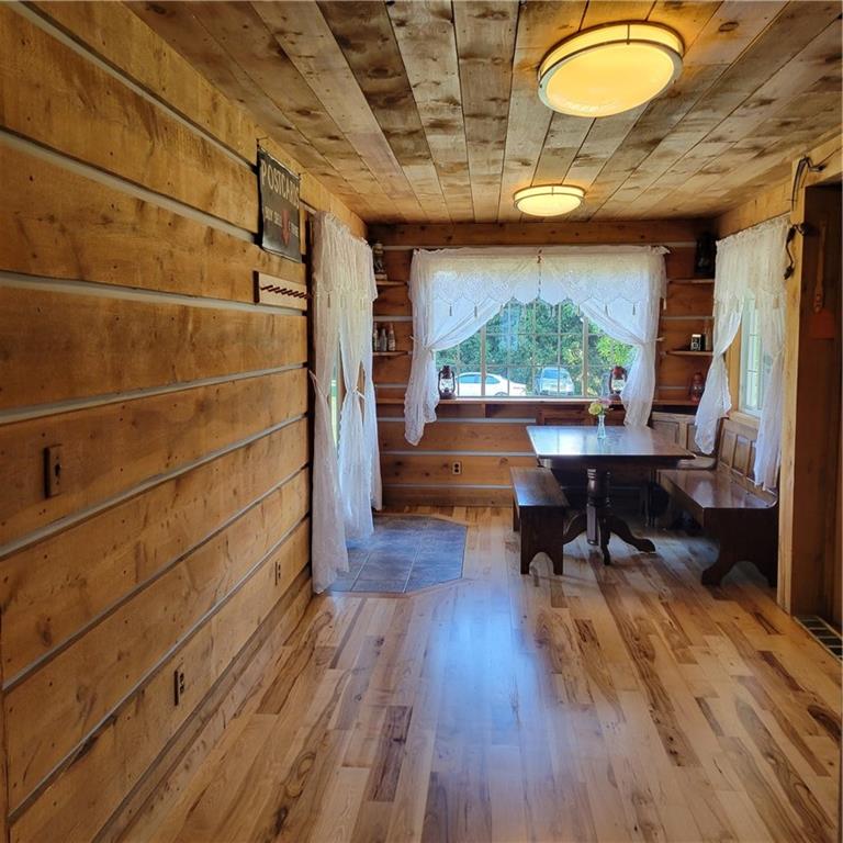 223 Seven Hills Road Chicora, PA 16025 - Photo 10 of 25 a room with wooden floor and a window