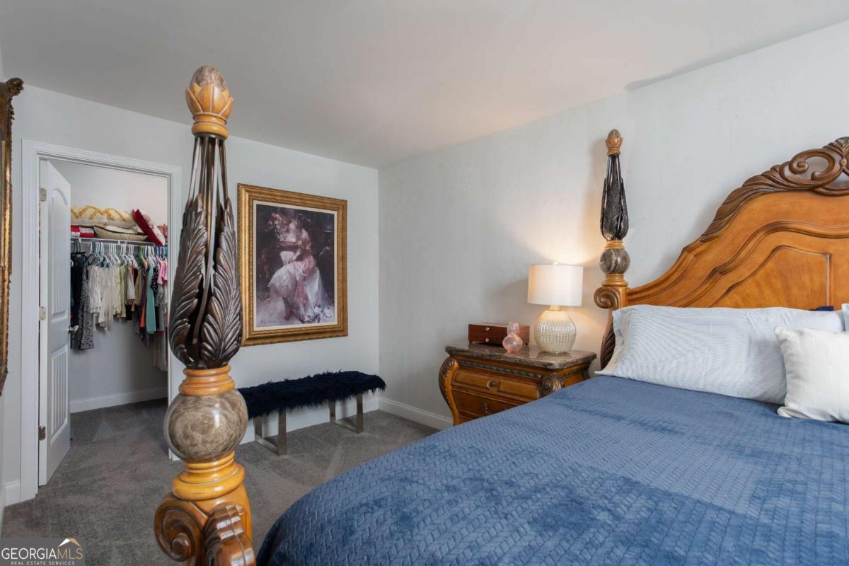 439 Gov Treutlen Circle Pooler, GA 31322 - Photo 13 of 21 a bedroom with furniture and a painting