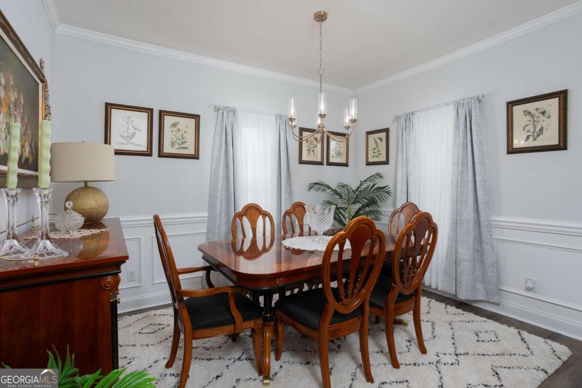 439 Gov Treutlen Circle Pooler, GA 31322 - Photo 4 of 21 a view of a dining room that has a table and chairs