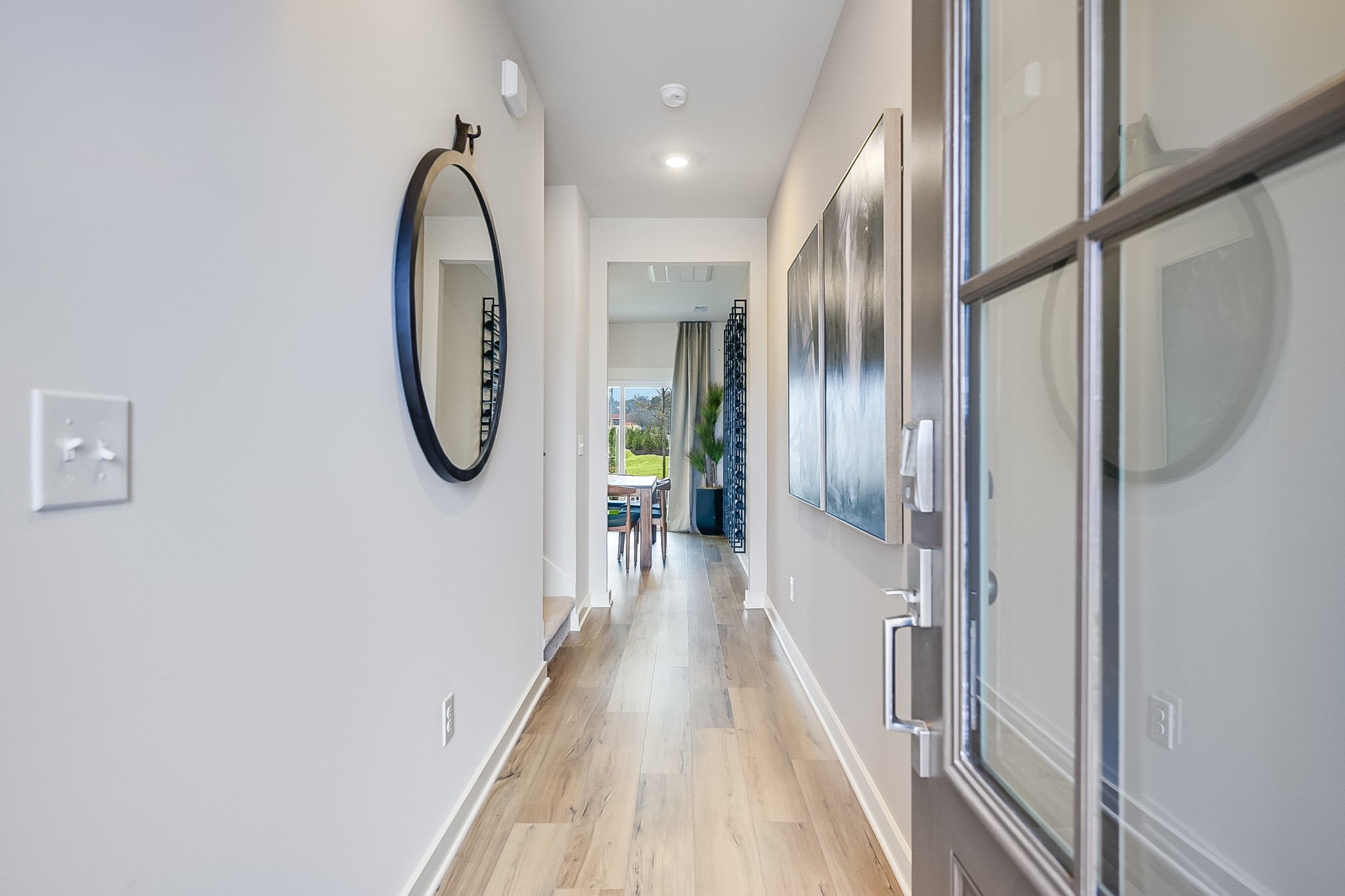 514 Lydia Ashley Lane Smyrna, TN 37167 - Photo 4 of 28 a view of a hallway with wooden floor and entryway