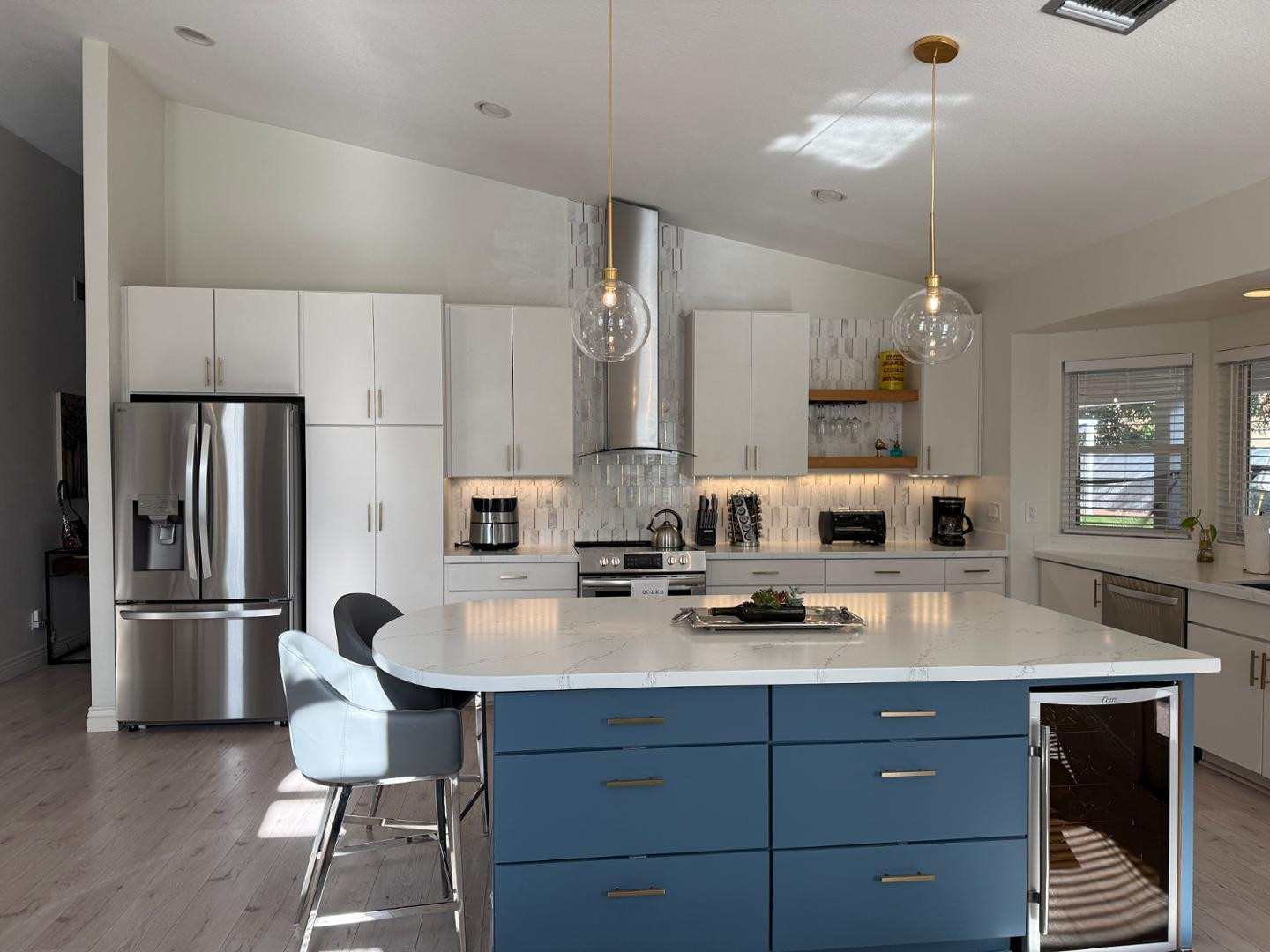 5449 East Phelps Road Scottsdale, AZ 85254 - Photo 9 of 28 a kitchen with refrigerator and cabinets
