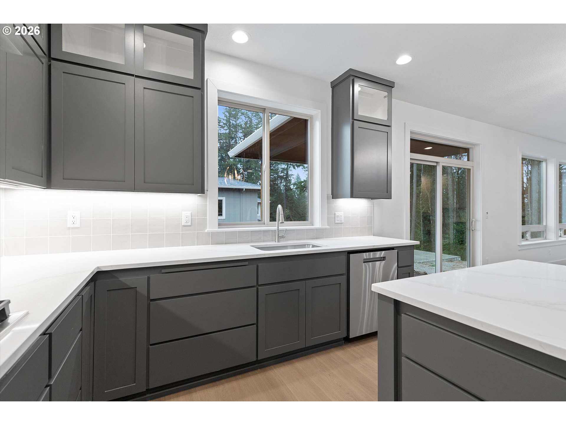 14992 Southeast Andre Way Clackamas, OR 97015 - Photo 12 of 42 a bathroom with a sink and a large mirror