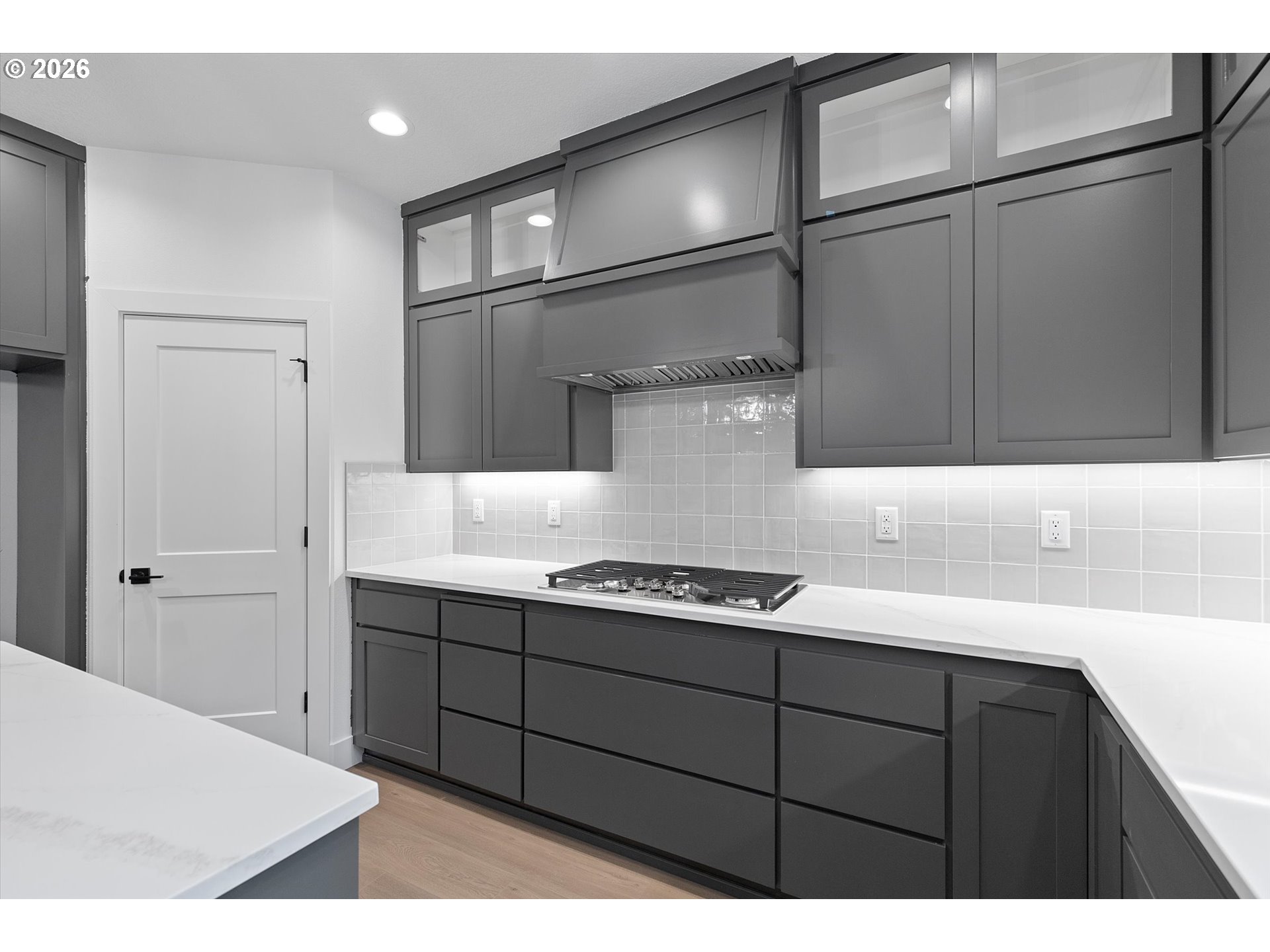 14992 Southeast Andre Way Clackamas, OR 97015 - Photo 13 of 42 a kitchen with a cabinets and a stove