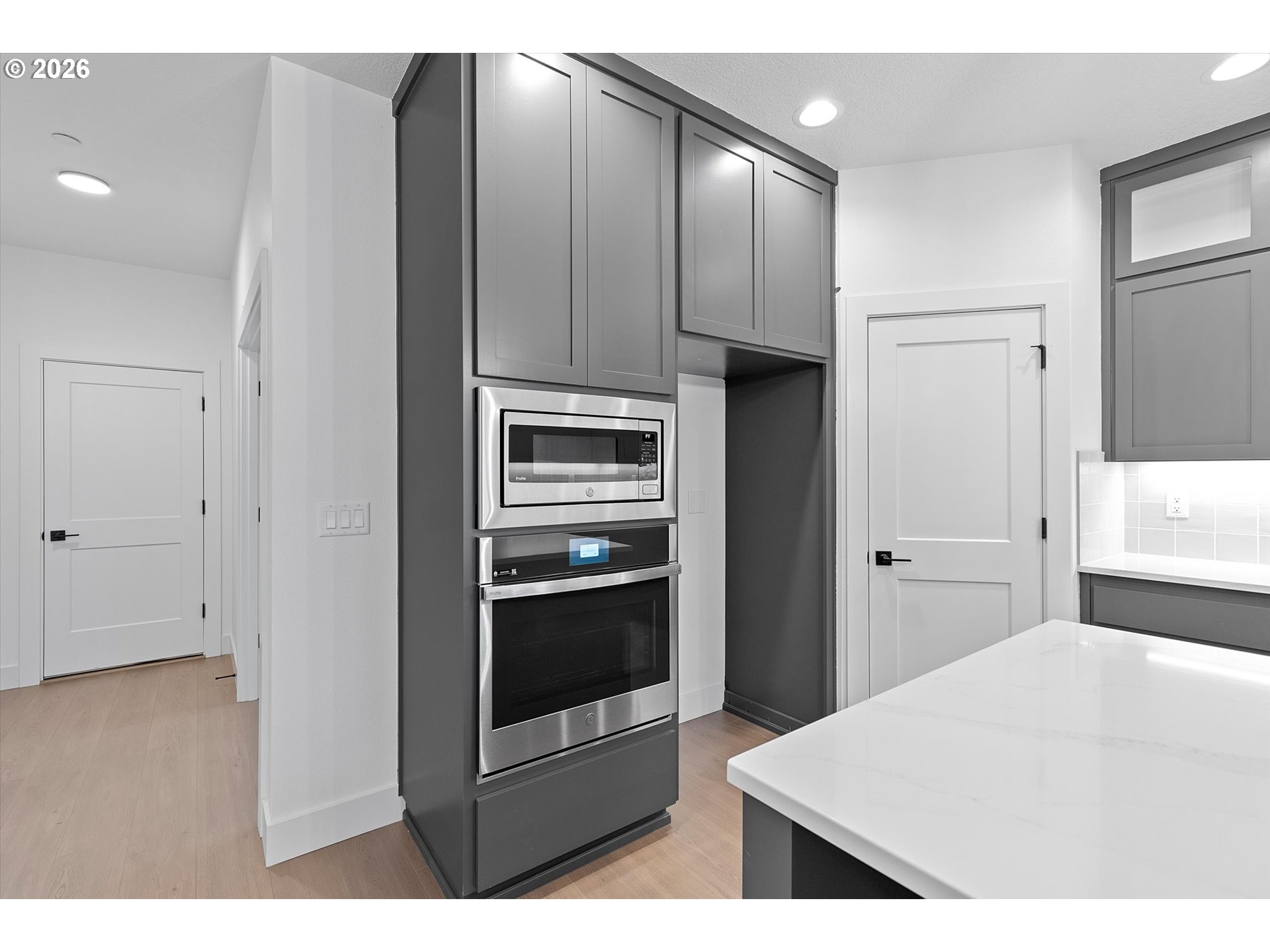 14992 Southeast Andre Way Clackamas, OR 97015 - Photo 14 of 42 a kitchen with cabinets and stainless steel appliances