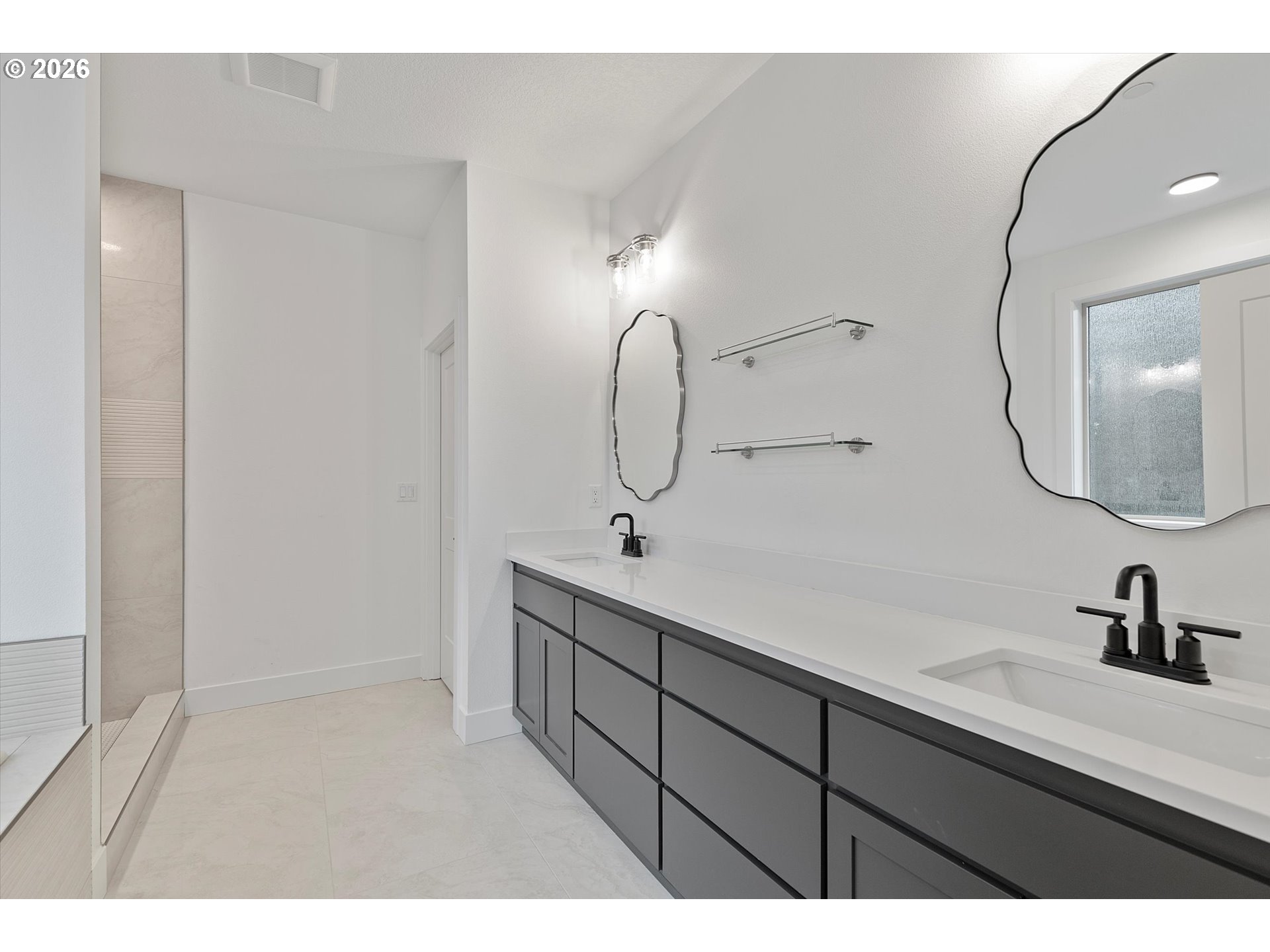 14992 Southeast Andre Way Clackamas, OR 97015 - Photo 28 of 42 a bathroom with a sink and a mirror