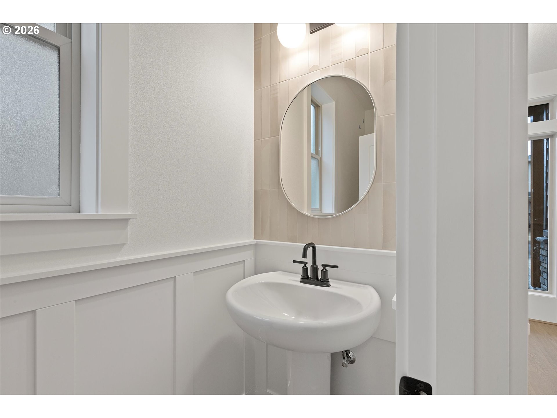 14992 Southeast Andre Way Clackamas, OR 97015 - Photo 3 of 42 a bathroom with a sink and a mirror