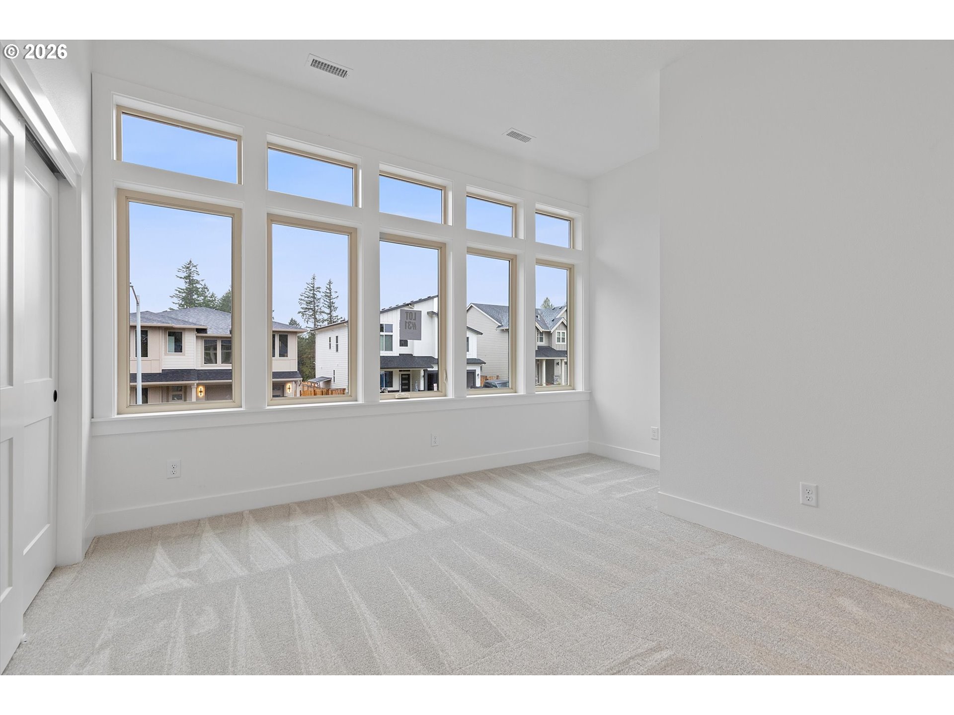 14992 Southeast Andre Way Clackamas, OR 97015 - Photo 32 of 42 a view of an empty room with a window