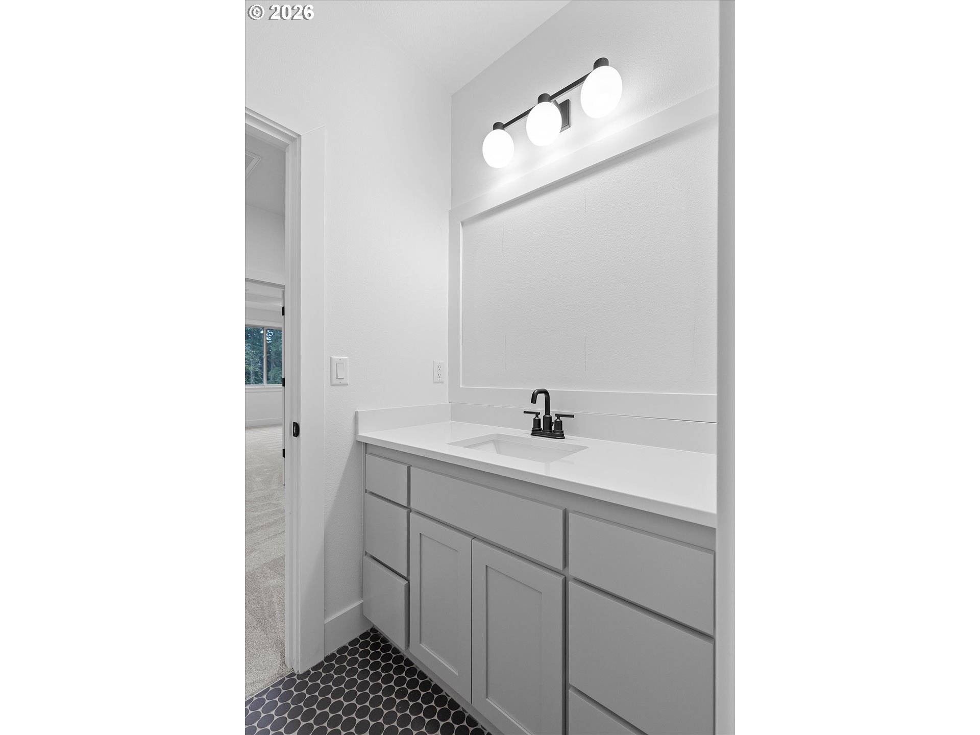 14992 Southeast Andre Way Clackamas, OR 97015 - Photo 36 of 42 a bathroom with a sink and a mirror