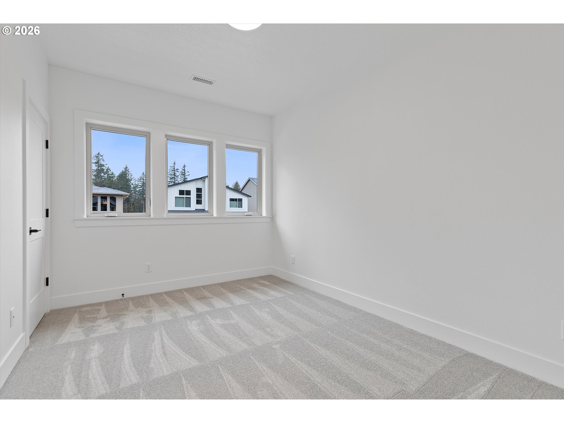 14992 Southeast Andre Way Clackamas, OR 97015 - Photo 38 of 42 a view of an empty room with a window