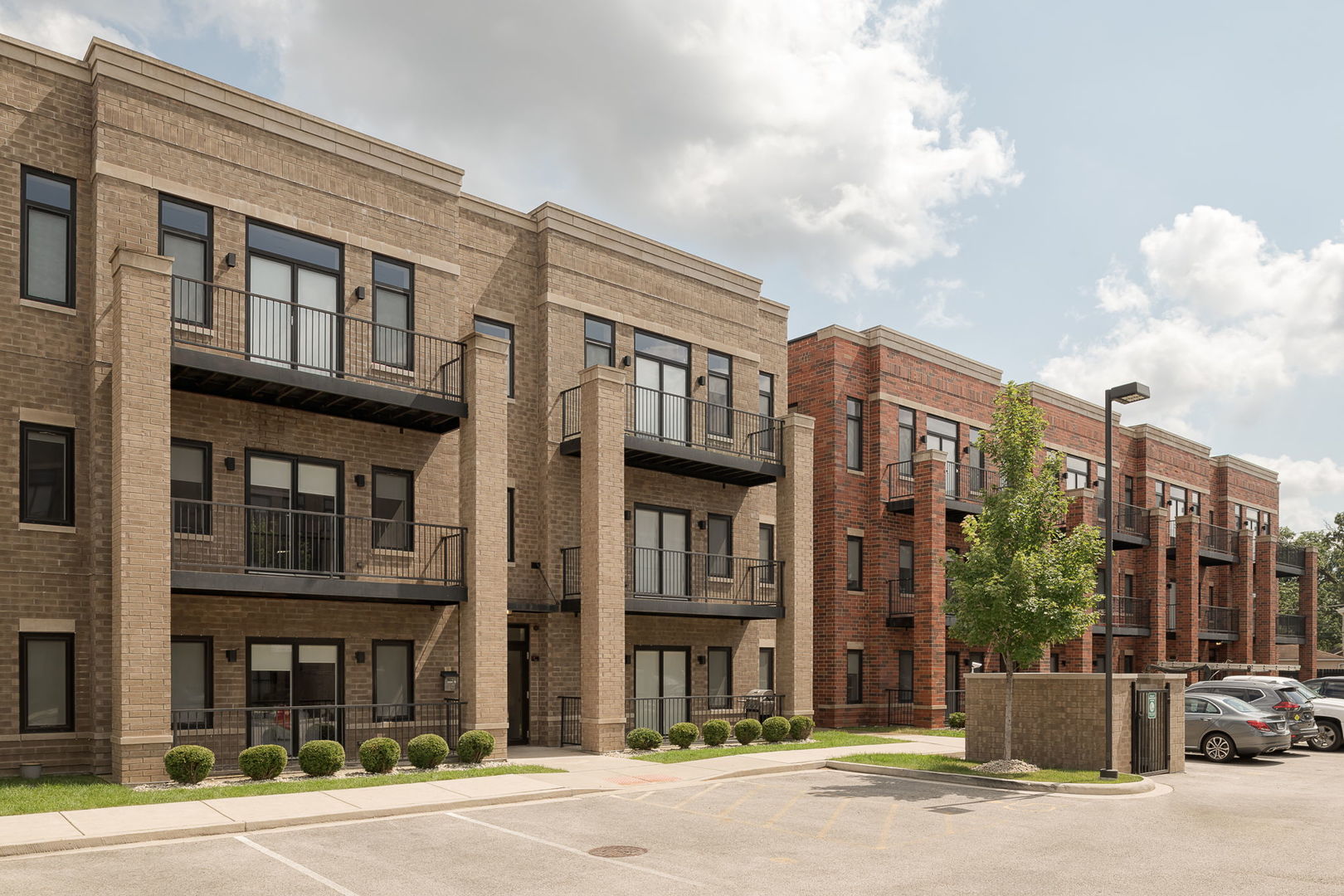 8465 Grand Avenue, Unit 302 River Grove, IL 60171 - Photo 1 of 18 a front view of a building with a street