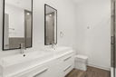 8465 Grand Avenue, Unit 302 River Grove, IL 60171 - Photo 10 of 18 a bathroom with a sink and a mirror