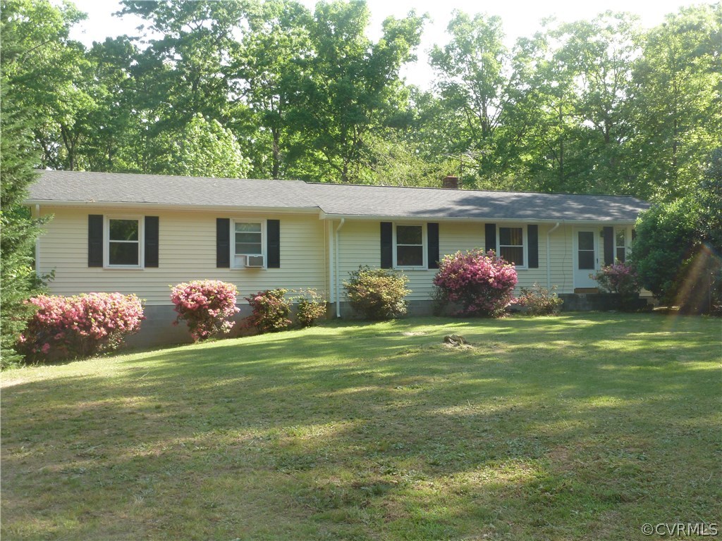 18078 Old Ridge Road Montpelier, VA 23192 - Photo 1 of 9 a front view of house with yard and green space