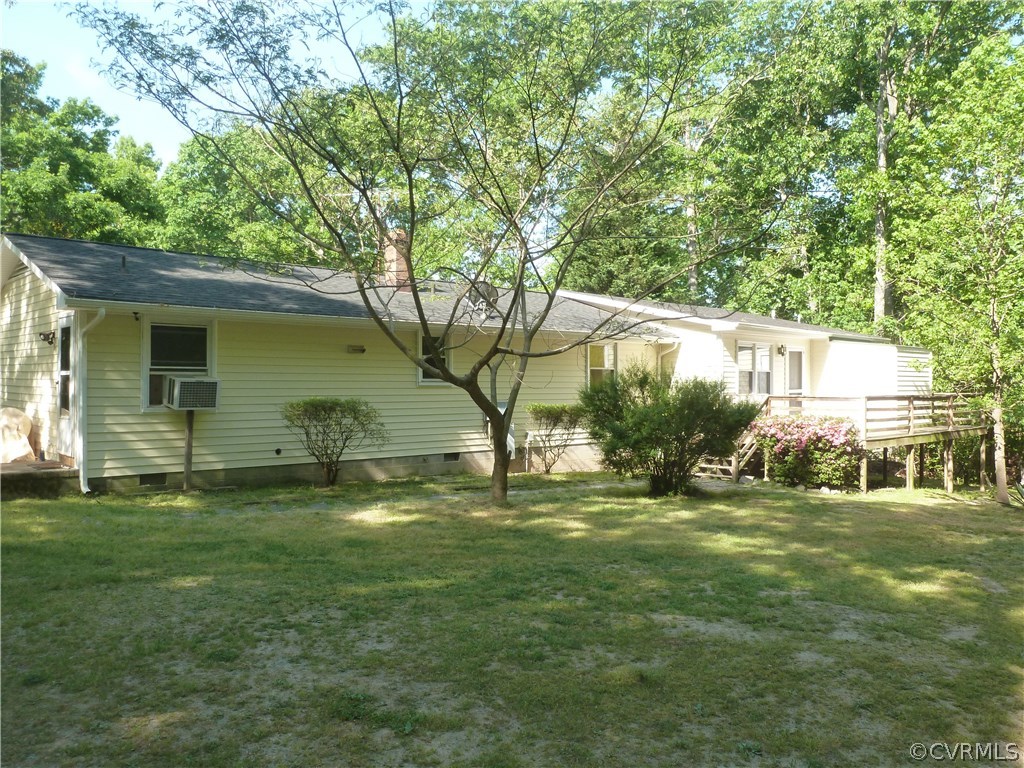 18078 Old Ridge Road Montpelier, VA 23192 - Photo 5 of 9 a backyard of a house with yard and outdoor seating