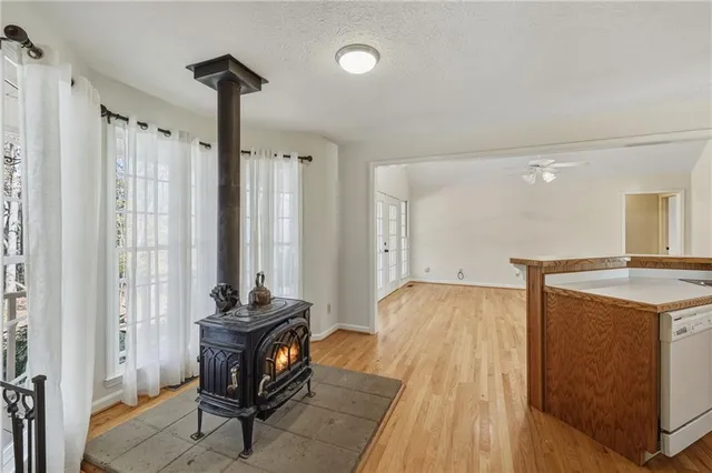 a spacious bathroom with a double vanity sink mirror and shower