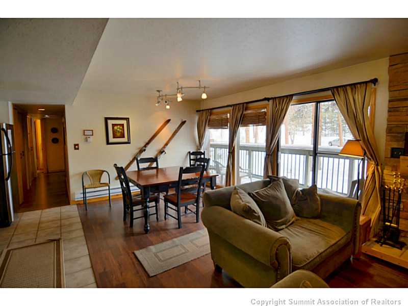 373 Wild Irishman Road, Unit 1076 Keystone, CO 80435 - Photo 22 of 25 Living Room. Large windows and doors to the deck