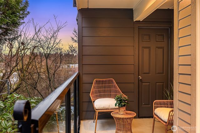 a view of a porch with seating space