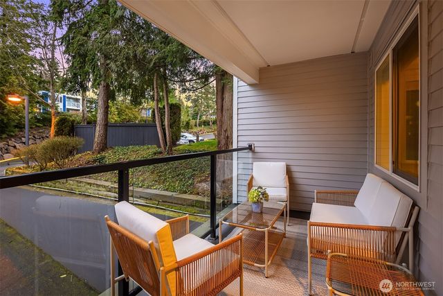 a view of a building with sitting area