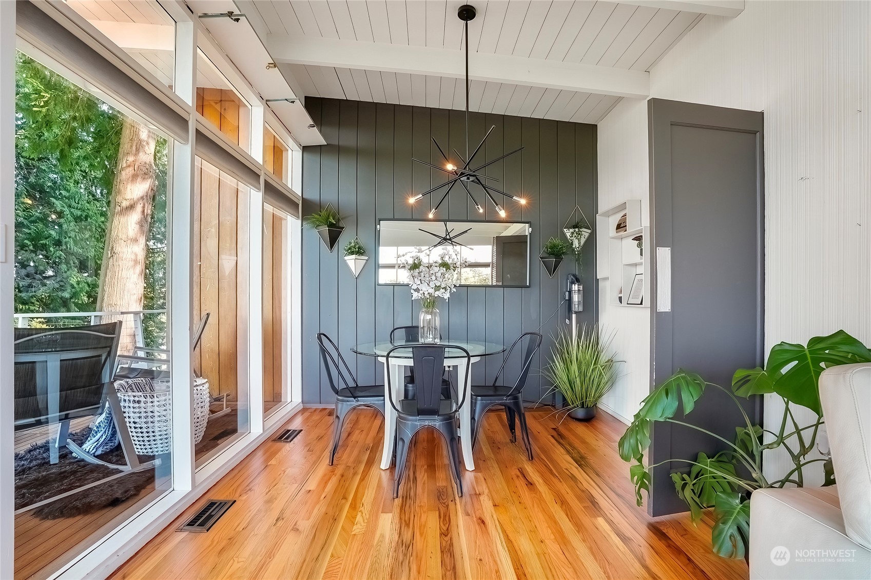 1104 39th Street Everett, WA 98201 - Photo 11 of 40 a view of a dining room with furniture window and wooden floor