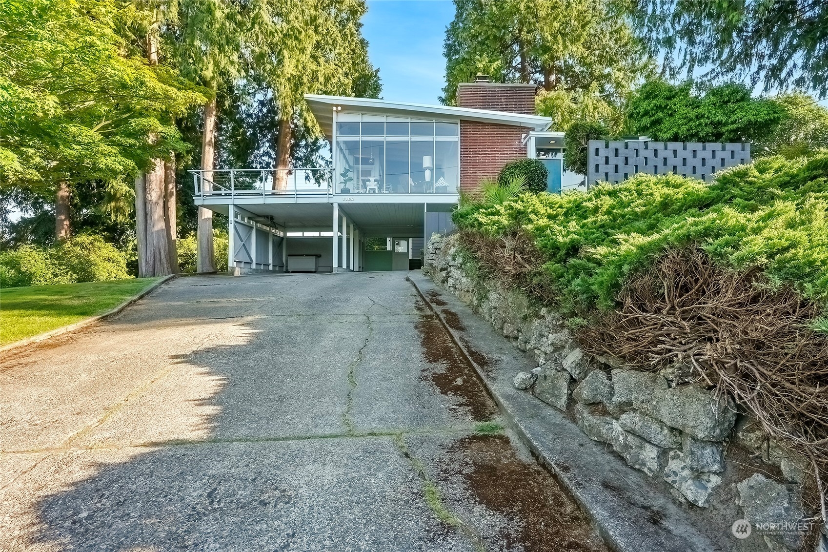 1104 39th Street Everett, WA 98201 - Photo 2 of 40 a view of a house with a yard and potted plants