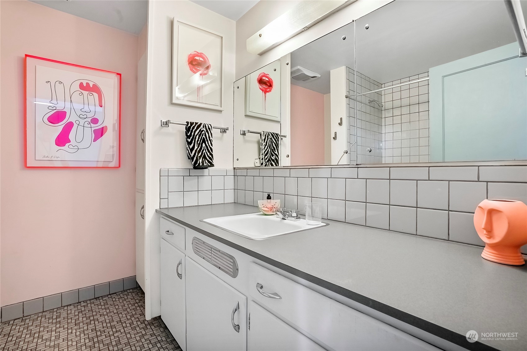 1104 39th Street Everett, WA 98201 - Photo 22 of 40 a bathroom with a sink and a mirror