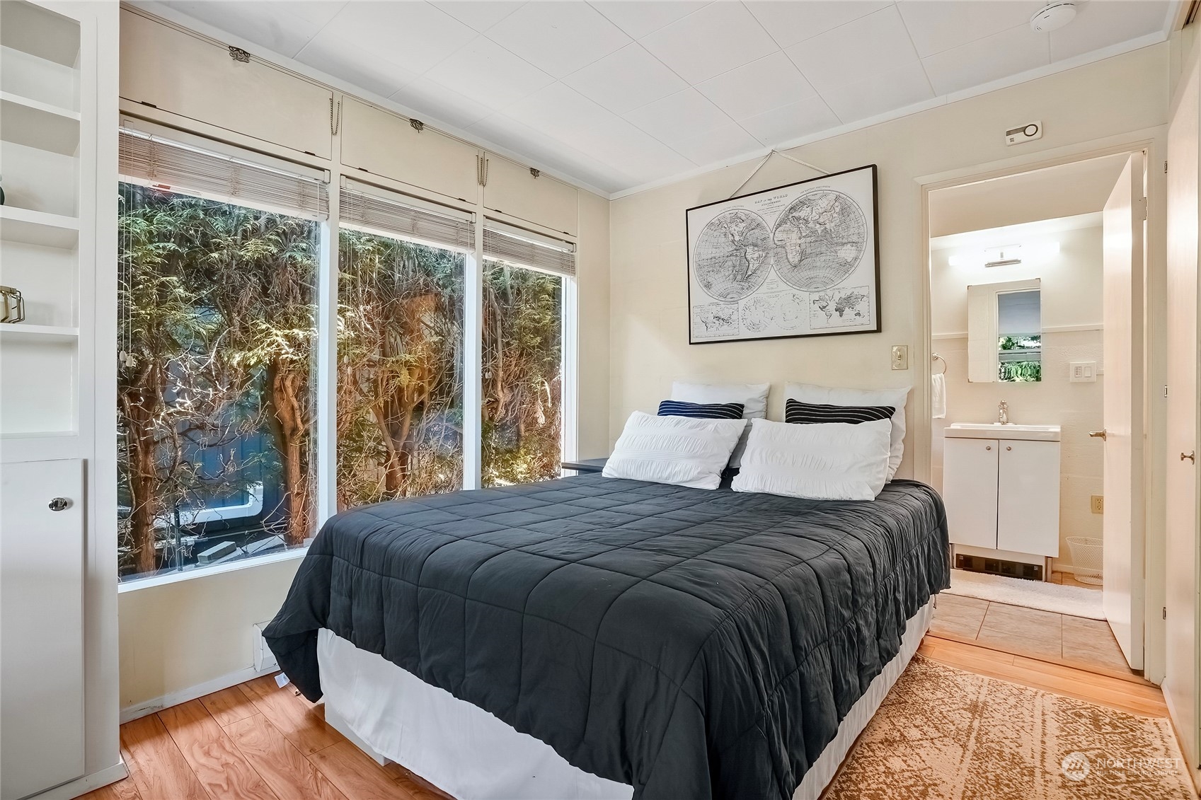 1104 39th Street Everett, WA 98201 - Photo 34 of 40 a bedroom with a large bed and a window