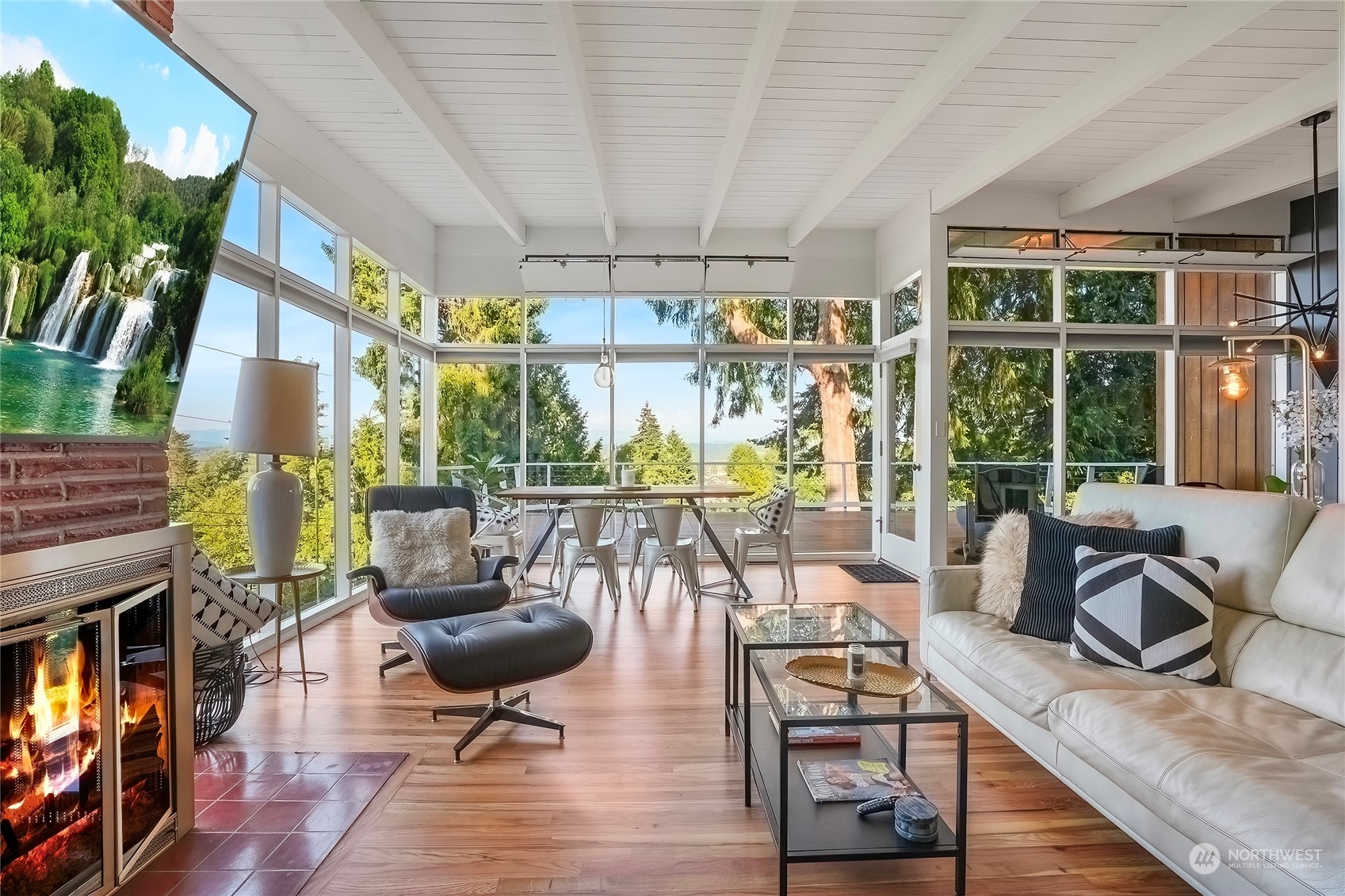 1104 39th Street Everett, WA 98201 - Photo 6 of 40 a living room with furniture a flat screen tv and a large window
