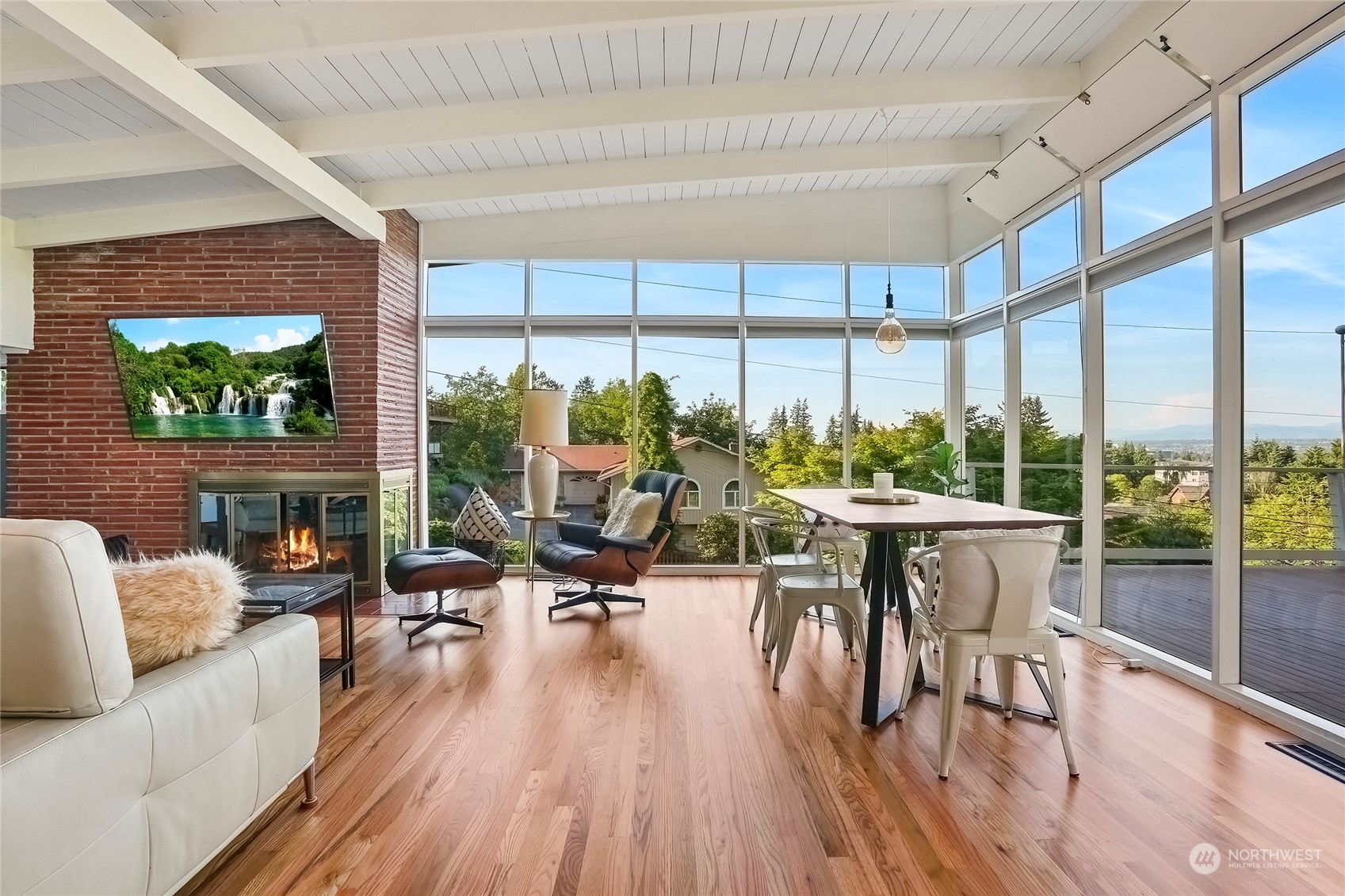 1104 39th Street Everett, WA 98201 - Photo 10 of 40 a living room with furniture a large window and wooden floor