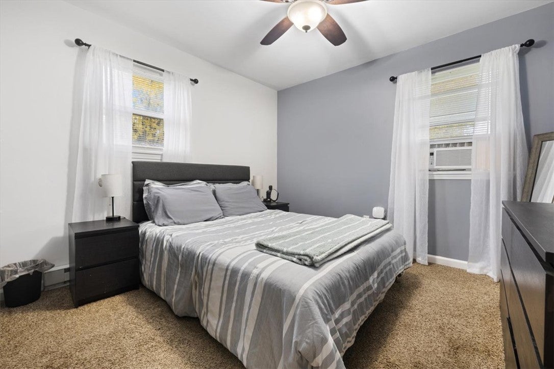 1482 Lee Road Troy, OH 45373 - Photo 15 of 30 This cozy bedroom features a neutral color palette and ample natural light, creating a comfortable retreat.