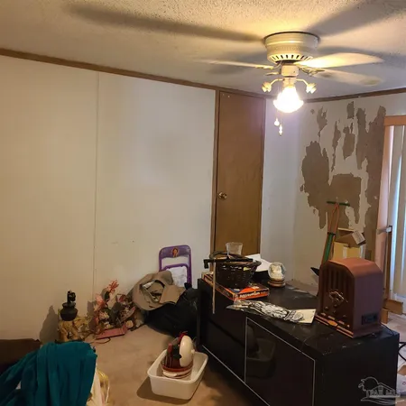 a room with furniture and gym equipment