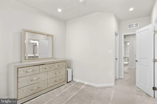 wooden floor with closet in it