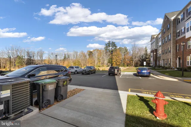 a view of a street with cars on both side