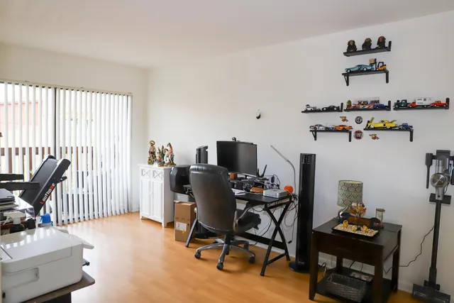 a workspace with furniture and a window