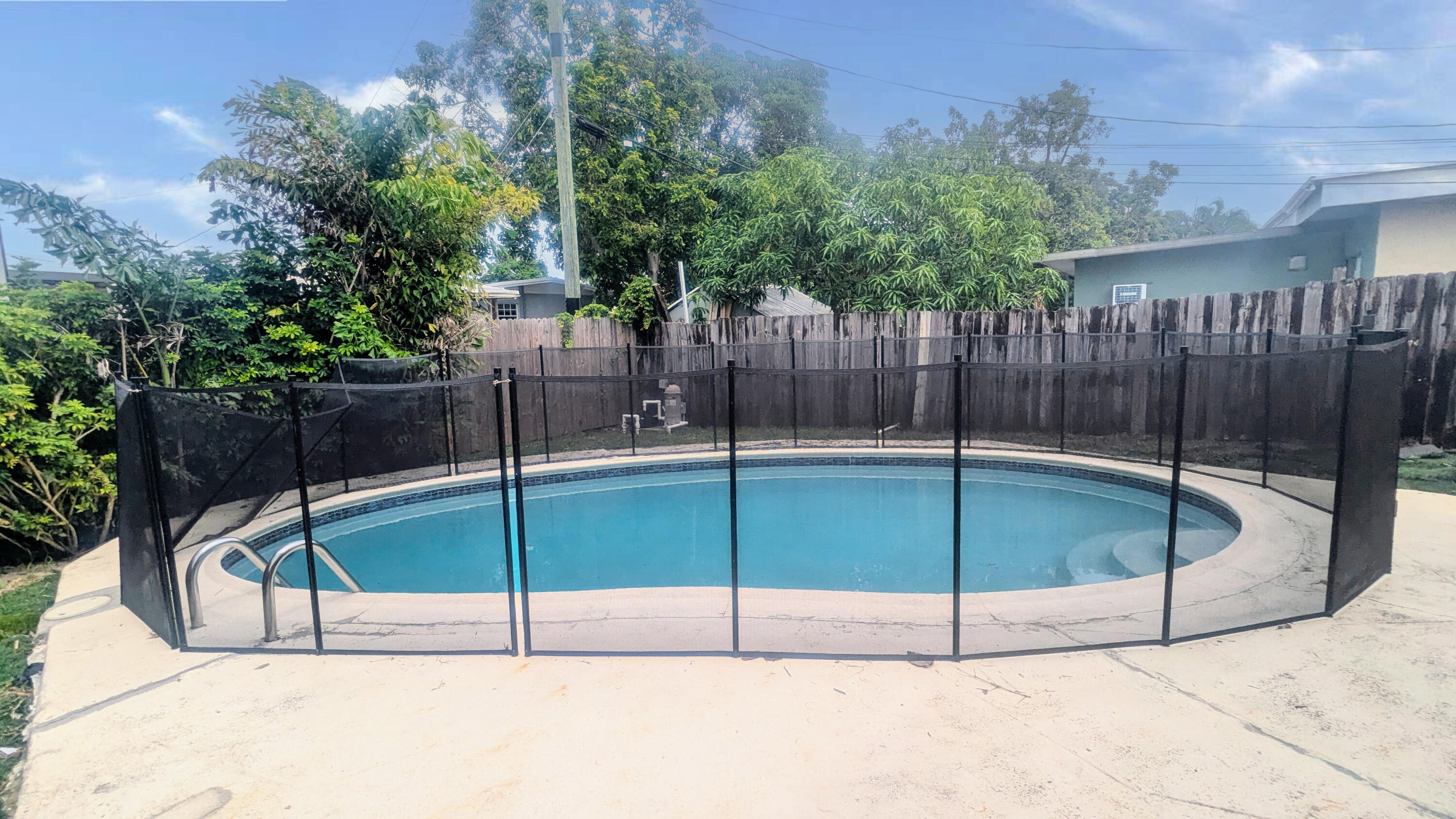 85 Morgans Way Palm Springs, FL 33461 - Photo 12 of 17 a view of a tennis court