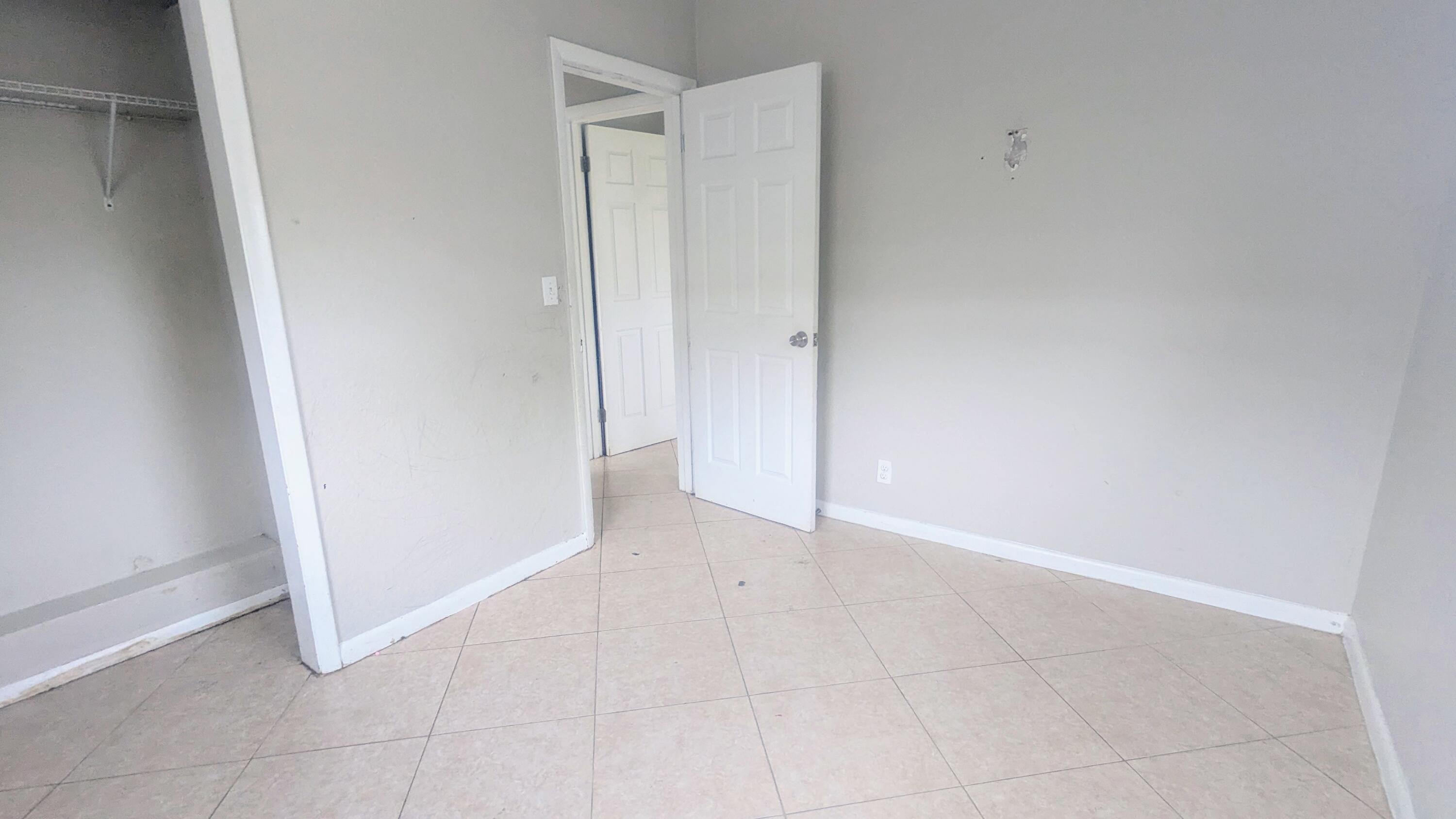 85 Morgans Way Palm Springs, FL 33461 - Photo 3 of 17 a view of an empty room
