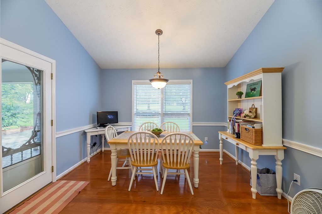 32 Bugle Brook Court Midland, GA 31820 - Photo 13 of 30 a view of a dining room with furniture window and outside view