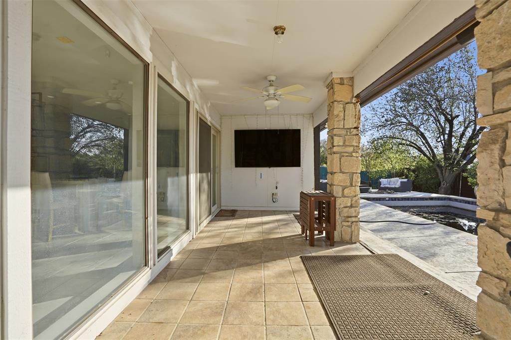 704 Timberview Court North Fort Worth, TX 76112 - Photo 33 of 40 a view of lobby with a couch and wooden floor